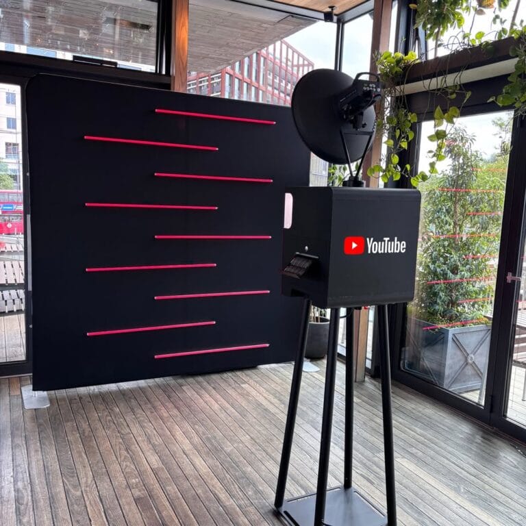 Our Open Air Photo Booth, featuring a Branded Wrap and a vibrant Neon Backdrop, was set up and r