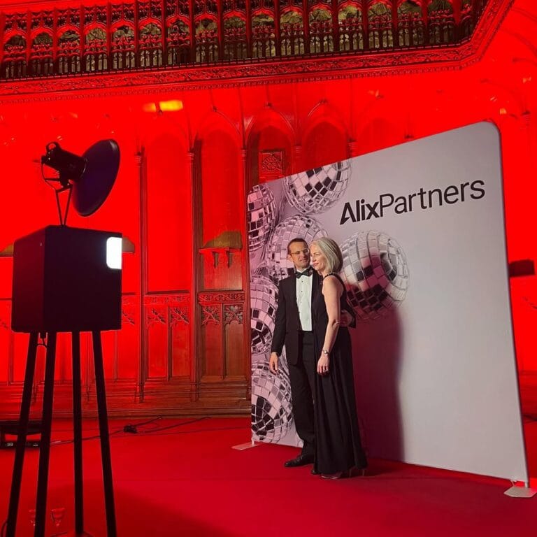 Our Open Air Photo Booth with a branded backdrop brought the holiday cheer to the Alix Partners